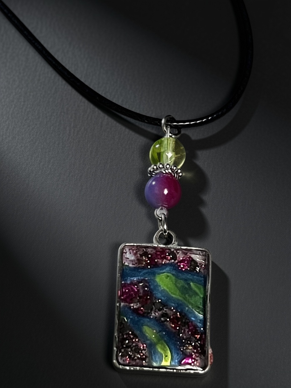 Blue,green, and dark pink necklace